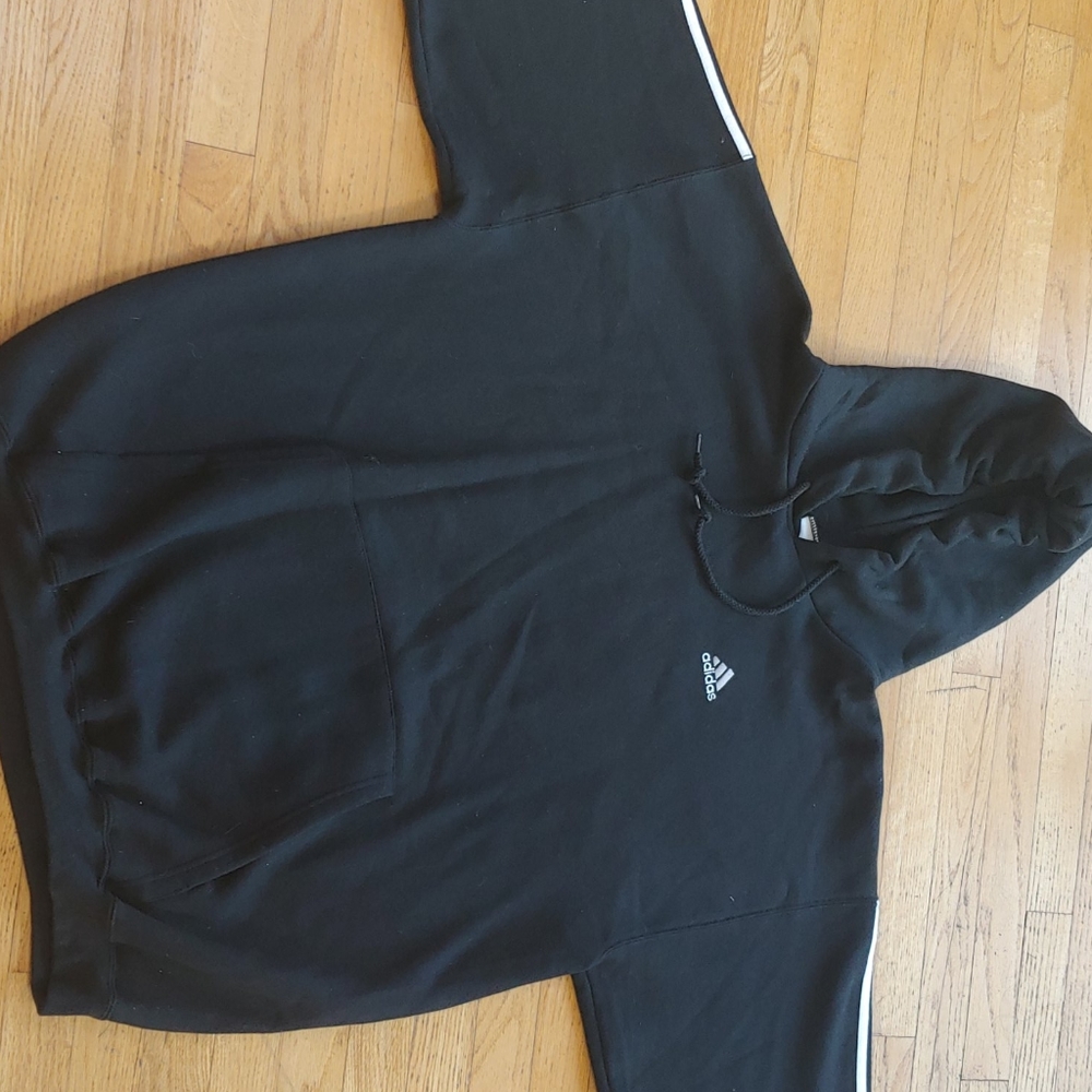 Adidas hooded with front pocket. New without tags.
